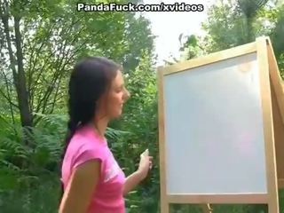 Flirty strap on fuck with young artist outdoor